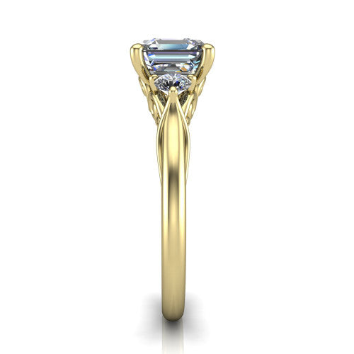 Harley square emerald three stone engagement ring in 18K Yellow Gold, side profile showing the filigree scroll gallery, tapered cathedral shoulders, and polished band