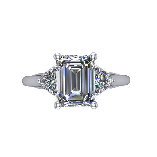 Harley emerald three stone engagement ring in Platinum, top-down view showing the step-cut emerald center diamond with two matched round side diamonds