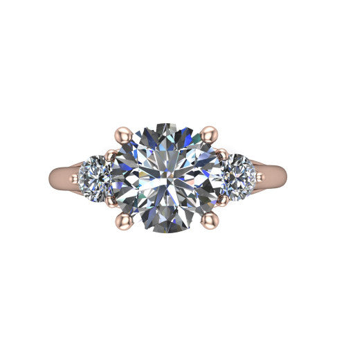 Harley round three stone engagement ring in 14K Rose Gold, top-down view showing the brilliant round center diamond with two matched round side diamonds