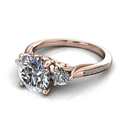 Celine round three stone engagement ring in 14K Rose Gold, three-quarter perspective showing the brilliant round center diamond flanked by two round side diamonds on a pave band