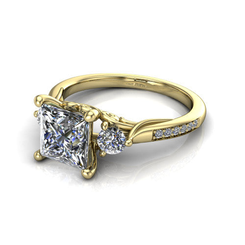 Celine princess three stone engagement ring in 14K Yellow Gold, three-quarter perspective showing the brilliant princess-cut center diamond flanked by two round side diamonds on a pave band