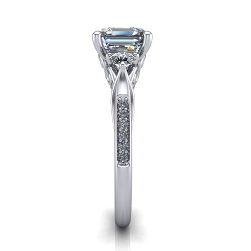Celine square emerald three stone engagement ring in 14K White Gold, side profile showing the filigree gallery and pave diamond band along the shoulders