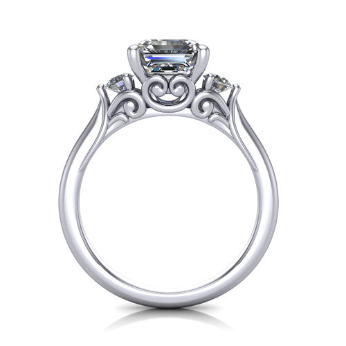 Celine square emerald three stone engagement ring in 14K White Gold, through-finger front profile showing the three-stone head and filigree scrollwork under-gallery