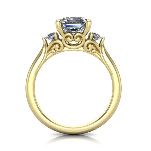 Celine square emerald three stone engagement ring in 18K Yellow Gold, through-finger front profile showing the three-stone head and filigree scrollwork under-gallery