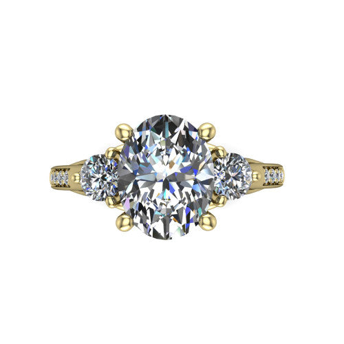 Celine oval three stone engagement ring in 14K Yellow Gold, top-down view showing the brilliant oval center diamond with two matched round side diamonds