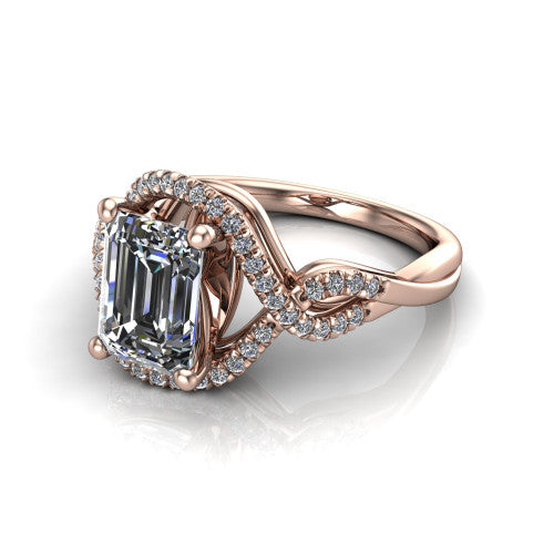 River emerald halo engagement ring in 18K Rose Gold, three-quarter perspective showing the step-cut emerald center diamond inside a pave halo on a twisted criss-cross pave split shank