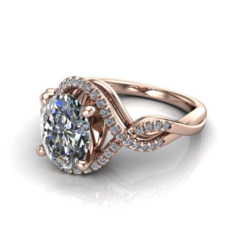 River oval halo engagement ring in 18K Rose Gold, three-quarter perspective showing the brilliant oval center diamond inside a pave halo on a twisted criss-cross pave split shank