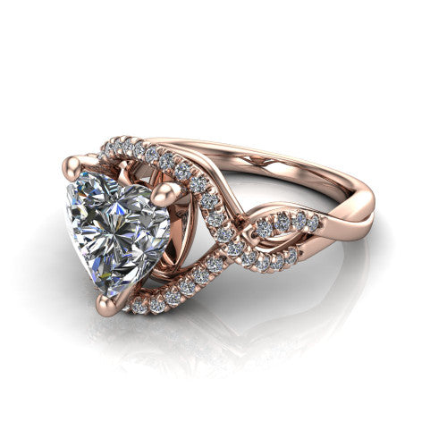 River heart halo engagement ring in 18K Rose Gold, three-quarter perspective showing the brilliant heart-shaped center diamond inside a pave halo on a twisted criss-cross pave split shank