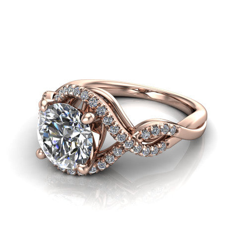 River round halo engagement ring in 14K Rose Gold, three-quarter perspective showing the brilliant round center diamond inside a pave halo on a twisted criss-cross pave split shank