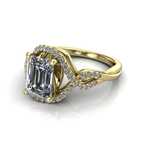 River emerald halo engagement ring in 18K Yellow Gold, three-quarter perspective showing the step-cut emerald center diamond inside a pave halo on a twisted criss-cross pave split shank