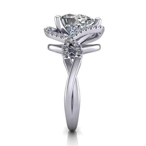 River pear halo engagement ring in Platinum, side profile showing the twisted criss-cross pave split shank braiding beneath the halo