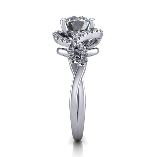 River round halo engagement ring in Platinum, side profile showing the twisted criss-cross pave split shank braiding beneath the halo
