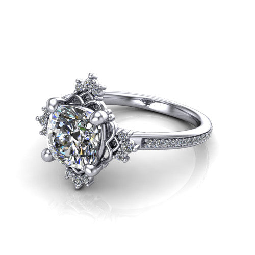 Jayla cushion solitaire engagement ring in 18K White Gold, three-quarter perspective showing the brilliant cushion-cut center diamond inside an ornate floral openwork frame on a pave band