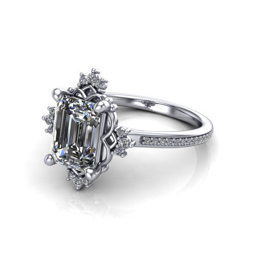 Jayla emerald solitaire engagement ring in 14K White Gold, three-quarter perspective showing the step-cut emerald center diamond inside an ornate floral openwork frame on a pave band