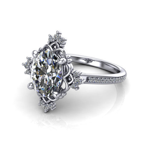Jayla oval solitaire engagement ring in 18K White Gold, three-quarter perspective showing the brilliant oval center diamond inside an ornate floral openwork frame on a pave band