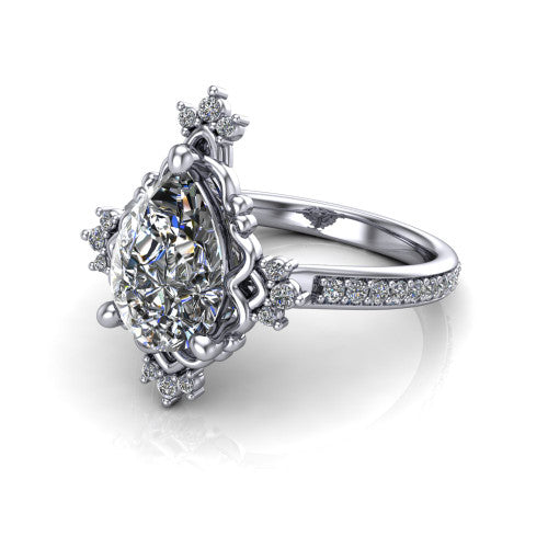 Jayla pear solitaire engagement ring in 18K White Gold, three-quarter perspective showing the brilliant pear-cut center diamond inside an ornate floral openwork frame on a pave band