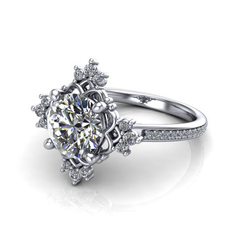 Jayla round solitaire engagement ring in 14K White Gold, three-quarter perspective showing the brilliant round center diamond inside an ornate floral openwork frame on a pave band