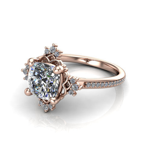 Jayla cushion solitaire engagement ring in 14K Rose Gold, three-quarter perspective showing the brilliant cushion-cut center diamond inside an ornate floral openwork frame on a pave band
