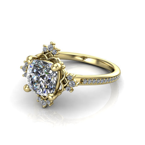 Jayla cushion solitaire engagement ring in 14K Yellow Gold, three-quarter perspective showing the brilliant cushion-cut center diamond inside an ornate floral openwork frame on a pave band