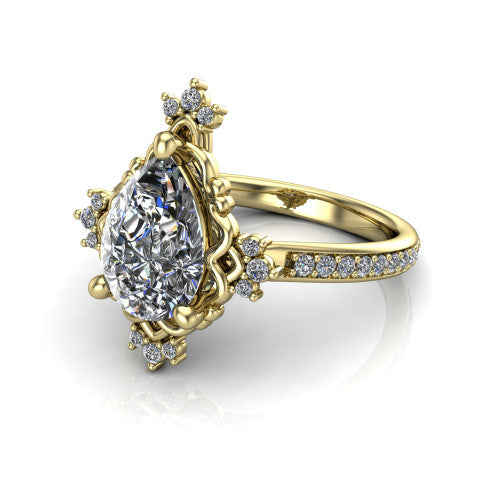 Jayla pear solitaire engagement ring in 18K Yellow Gold, three-quarter perspective showing the brilliant pear-cut center diamond inside an ornate floral openwork frame on a pave band