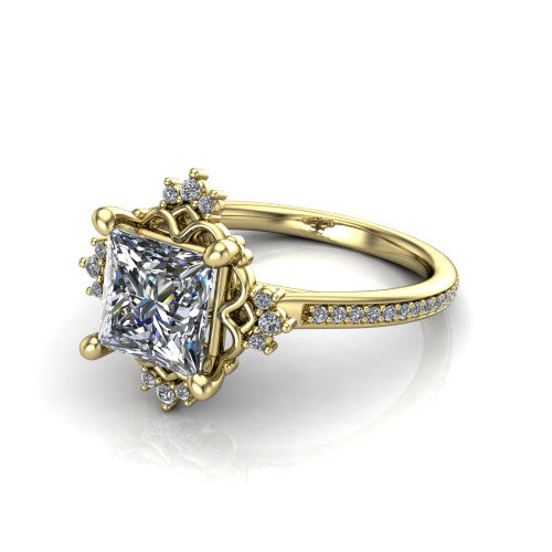 Jayla princess solitaire engagement ring in 14K Yellow Gold, three-quarter perspective showing the brilliant princess-cut center diamond inside an ornate floral openwork frame on a pave band
