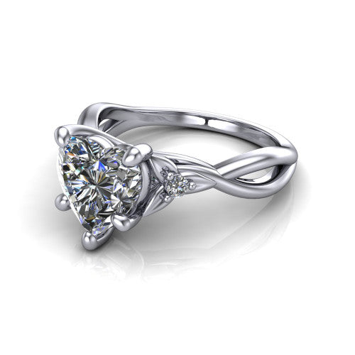 Catalina heart three stone engagement ring in 14K White Gold, three-quarter perspective showing the brilliant heart-shaped center diamond flanked by two round side accent diamonds on a twisted infinity shank