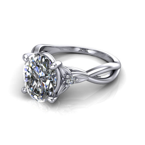 Catalina oval three stone engagement ring in 14K White Gold, three-quarter perspective showing the brilliant oval center diamond flanked by two round side accent diamonds on a twisted infinity shank