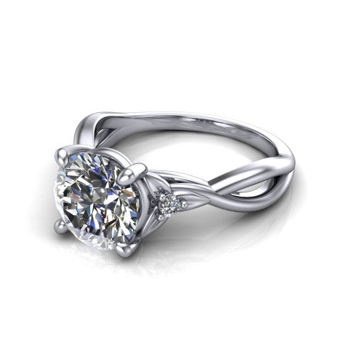 Catalina round three stone engagement ring in 14K White Gold, three-quarter perspective showing the brilliant round center diamond flanked by two round side accent diamonds on a twisted infinity shank