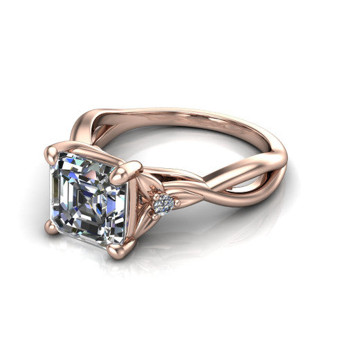 Catalina square emerald three stone engagement ring in 18K Rose Gold, three-quarter perspective showing the step-cut square emerald center diamond flanked by two round side accent diamonds on a twisted infinity shank