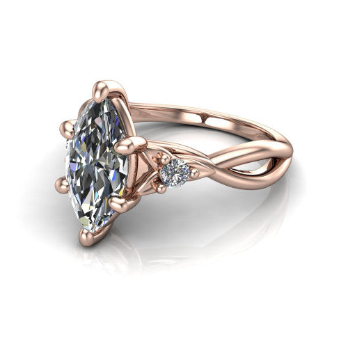 Catalina marquise three stone engagement ring in 14K Rose Gold, three-quarter perspective showing the brilliant marquise center diamond flanked by two round side accent diamonds on a twisted infinity shank