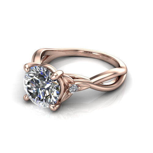 Catalina round three stone engagement ring in 14K Rose Gold, three-quarter perspective showing the brilliant round center diamond flanked by two round side accent diamonds on a twisted infinity shank