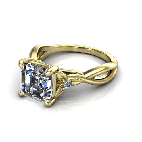 Catalina square emerald three stone engagement ring in 18K Yellow Gold, three-quarter perspective showing the step-cut square emerald center diamond flanked by two round side accent diamonds on a twisted infinity shank