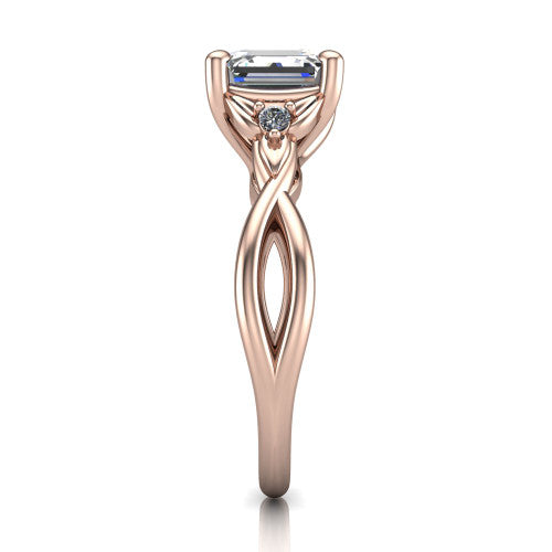 Catalina square emerald three stone engagement ring in 14K Rose Gold, side profile showing the twisted infinity shank braiding beneath the head into a polished band