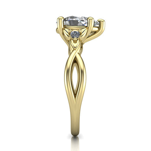 Catalina pear three stone engagement ring in 14K Yellow Gold, side profile showing the twisted infinity shank braiding beneath the head into a polished band