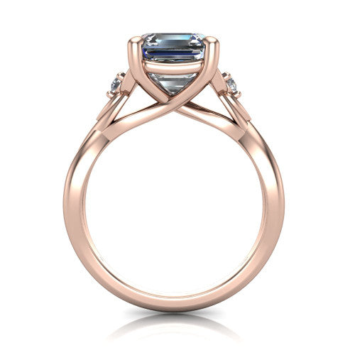 Catalina square emerald three stone engagement ring in 18K Rose Gold, through-finger front profile showing the three-stone head and woven infinity shank