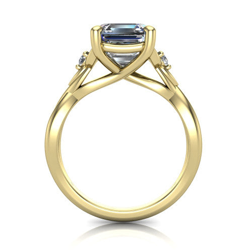 Catalina square emerald three stone engagement ring in 18K Yellow Gold, through-finger front profile showing the three-stone head and woven infinity shank