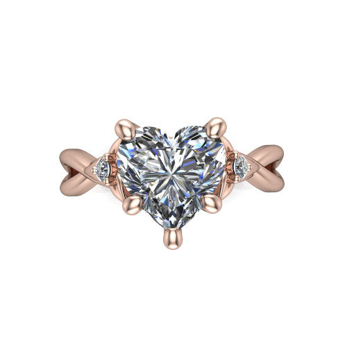 Catalina heart three stone engagement ring in 14K Rose Gold, top-down view showing the brilliant heart-shaped center diamond with two small round side accent diamonds