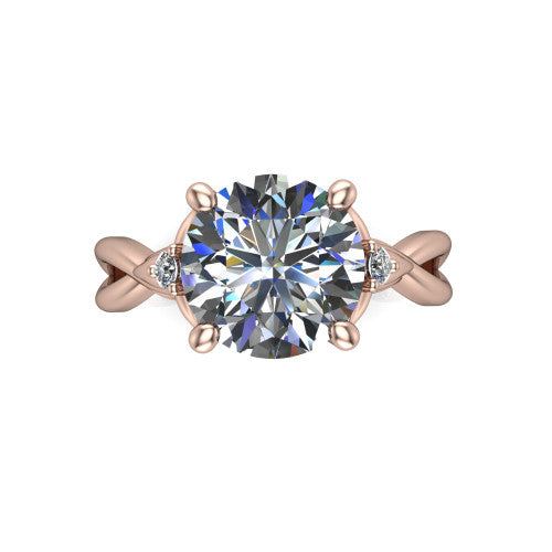 Catalina round three stone engagement ring in 14K Rose Gold, top-down view showing the brilliant round center diamond with two small round side accent diamonds