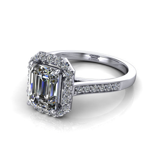 Brooke emerald halo engagement ring in 18K White Gold, three-quarter perspective showing the haloed center above a slim pav&eacute; band with a peekaboo gallery accent