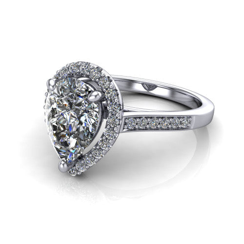 Brooke pear halo engagement ring in 18K White Gold, three-quarter perspective showing the haloed center above a slim pav&eacute; band with a peekaboo gallery accent