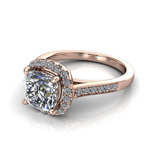 Brooke cushion halo engagement ring in 14K Rose Gold, three-quarter perspective showing the haloed center above a slim pav&eacute; band with a peekaboo gallery accent