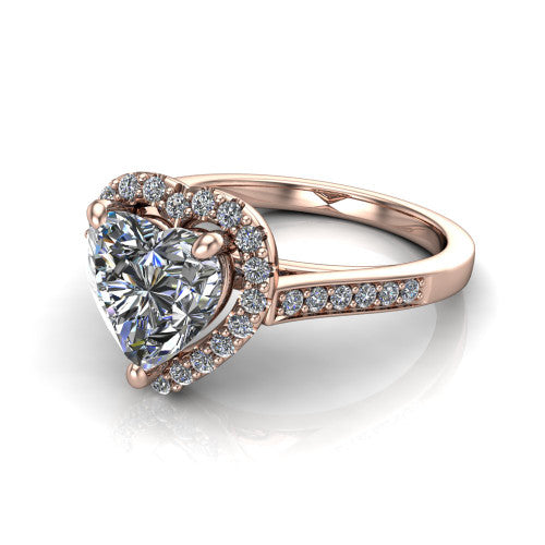 Brooke heart halo engagement ring in 18K Rose Gold, three-quarter perspective showing the haloed center above a slim pav&eacute; band with a peekaboo gallery accent