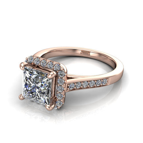 Brooke princess halo engagement ring in 14K Rose Gold, three-quarter perspective showing the haloed center above a slim pav&eacute; band with a peekaboo gallery accent