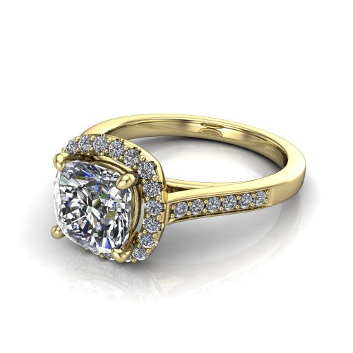 Brooke cushion halo engagement ring in 18K Yellow Gold, three-quarter perspective showing the haloed center above a slim pav&eacute; band with a peekaboo gallery accent