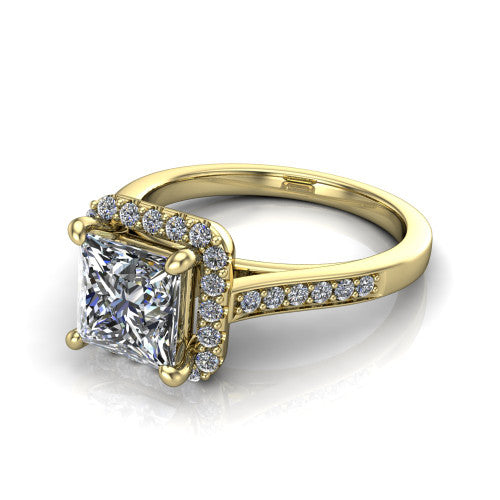 Brooke princess halo engagement ring in 18K Yellow Gold, three-quarter perspective showing the haloed center above a slim pav&eacute; band with a peekaboo gallery accent