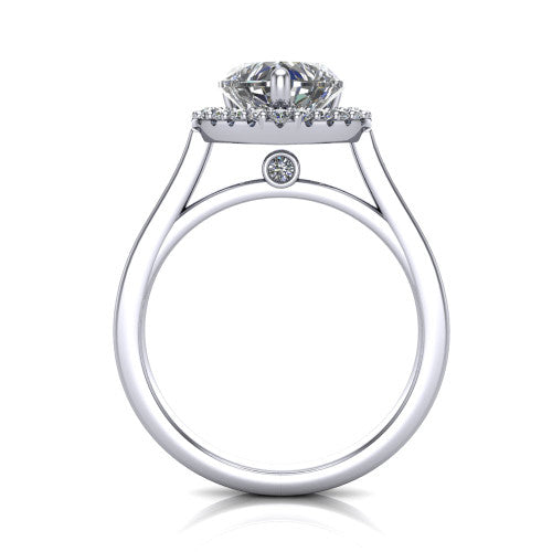 Brooke heart halo engagement ring in Platinum, through-finger front profile showing the cathedral gallery with a bezel-set peekaboo diamond beneath the center