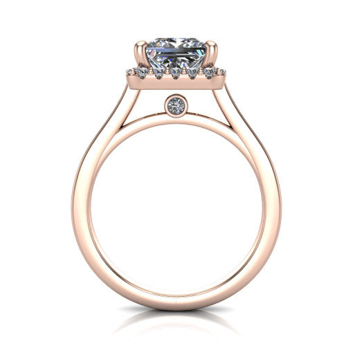 Brooke princess halo engagement ring in 18K Rose Gold, through-finger front profile showing the cathedral gallery with a bezel-set peekaboo diamond beneath the center