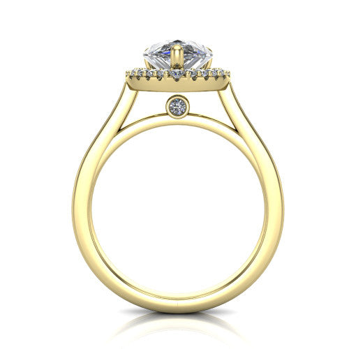 Brooke pear halo engagement ring in 14K Yellow Gold, through-finger front profile showing the cathedral gallery with a bezel-set peekaboo diamond beneath the center