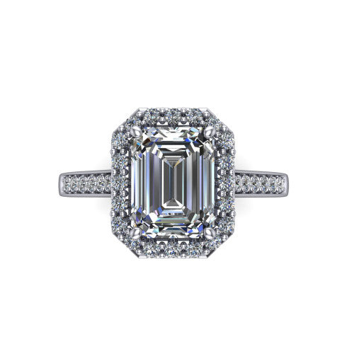 Brooke emerald halo engagement ring in 18K White Gold, top-down view showing the center framed by a emerald pav&eacute; halo with compass prongs