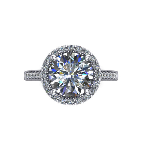 Brooke round halo engagement ring in Platinum, top-down view showing the center framed by a round pav&eacute; halo with compass prongs